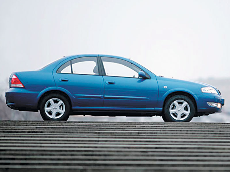 Nissan almera classic vs ford focus #4